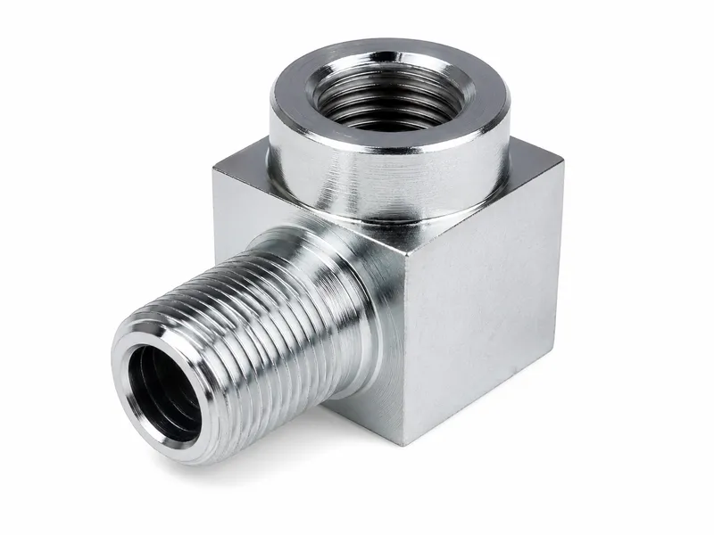 Right-angle BSP adapter with one external and one internal threaded port