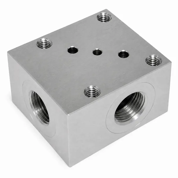 Steel hydraulic valve body with precision bored valve cavities